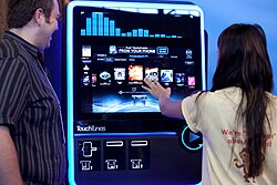 TouchTunes digital jukebox operated by General Vending in a bar or restaurant